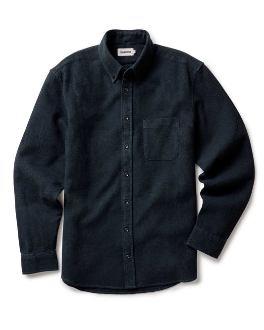 Taylor Stitch Jack Shirt in Forest Waffle, flat lay front view showing dark forest green waffle-knit fabric, button-down collar, chest pocket, and lock-stitched buttons on white background