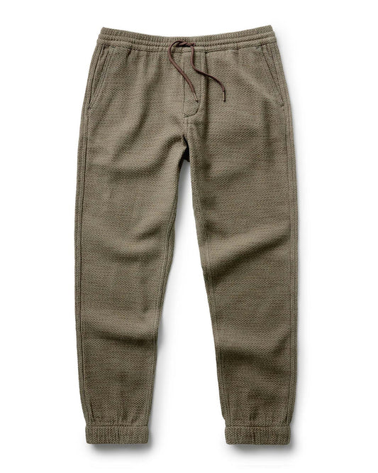 Taylor Stitch Après Ski Pant in Cypress Sashiko, flat lay showing full length olive green sashiko-woven jogger with drawcord waist and elastic cuffs
