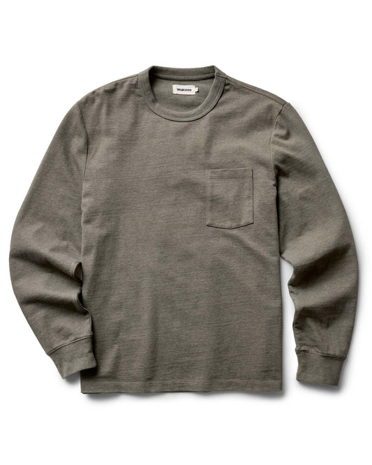 Flat lay of The Long Sleeve Shop Tee in Army Twist by Taylor Stitch — an army green heavyweight cotton long-sleeve tee with a chest pocket and ribbed cuffs, on a white background