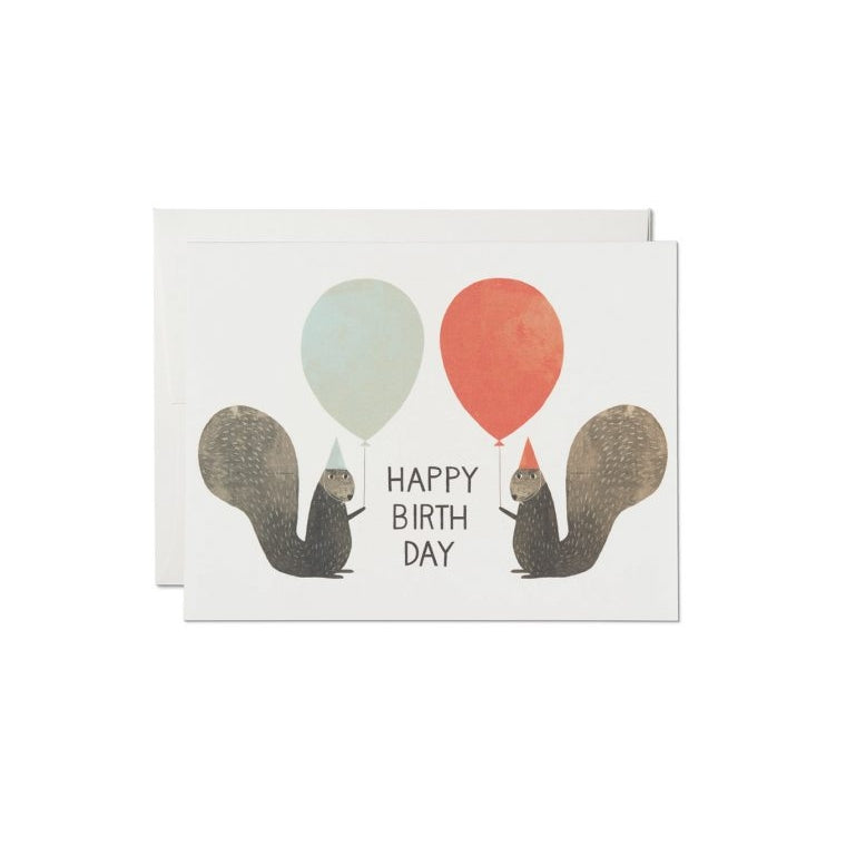 Greeting card with an illustration of two squirrels wearing party hats and a balloon, with 'Happy Birthday' text and a balloon bouquet.