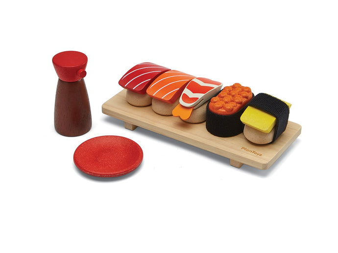 plan toys sushi set laydown set up on white background
