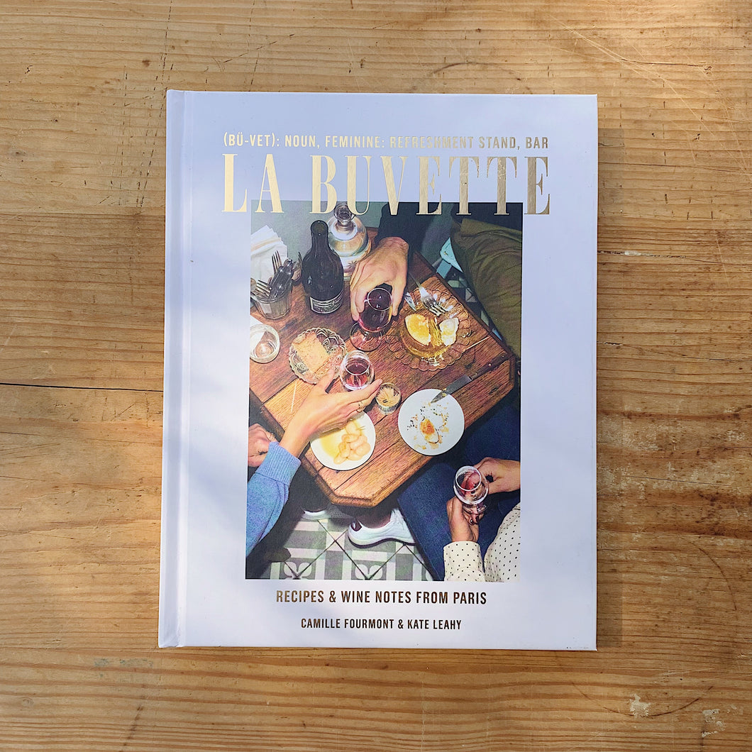 la buvette front cover laydown on wooden background