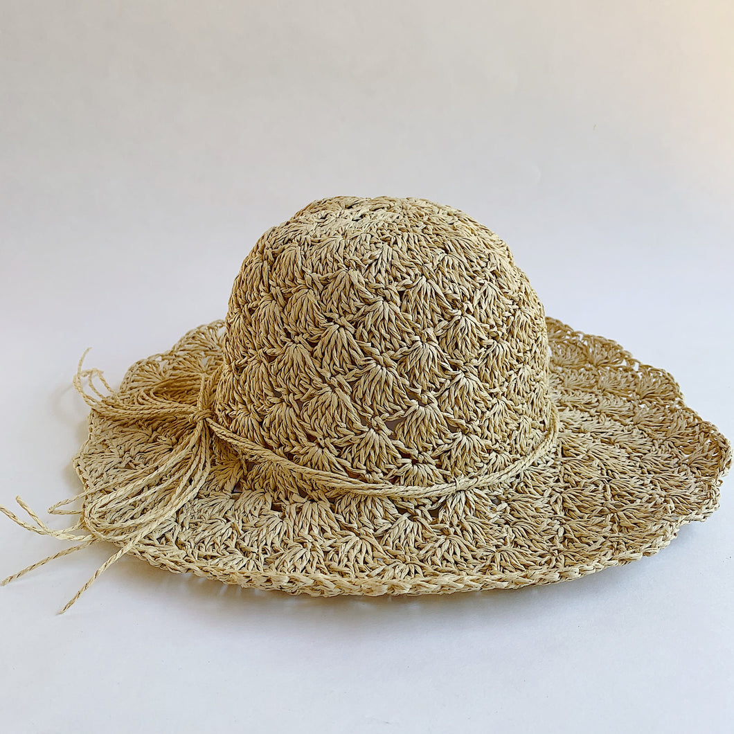 loose weave hat laydown front view on white background