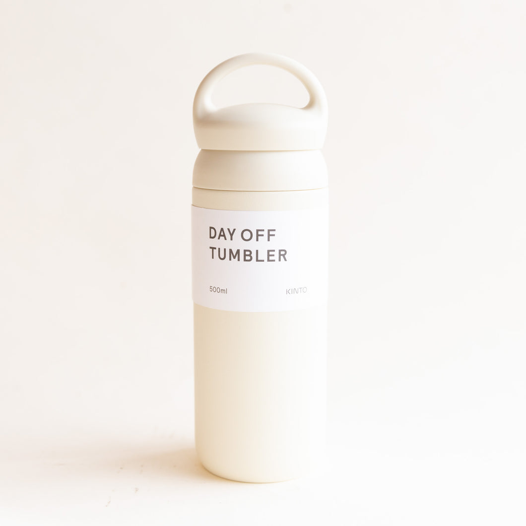 front view of day off tumbler in white