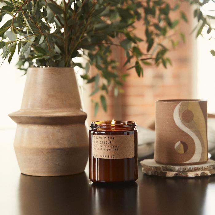 pf candle co pinon front view in situ on table