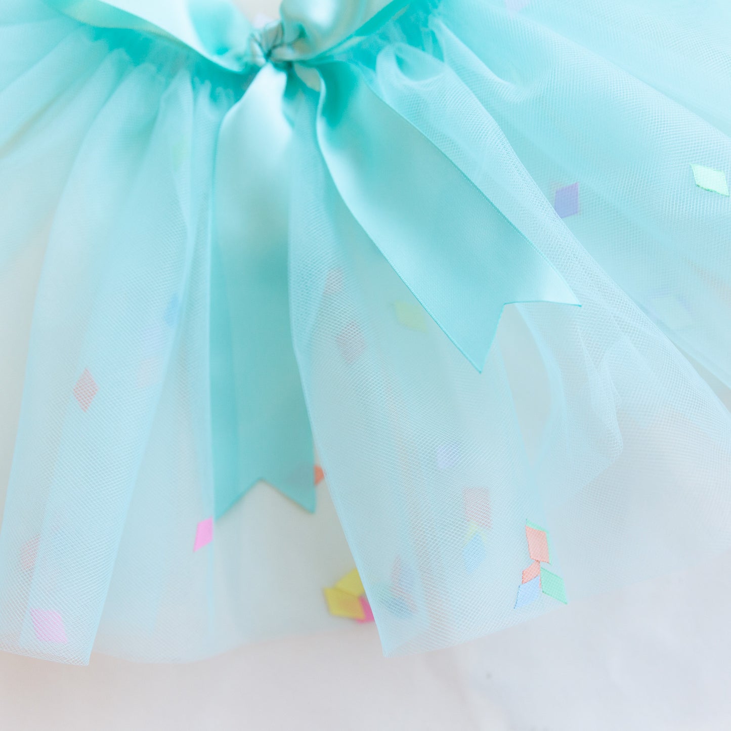 detail of turquoise confetti tutu