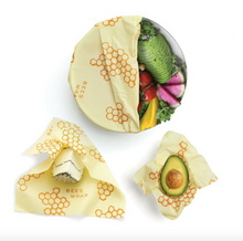 Load image into Gallery viewer, bee&#39;s wrap assorted 3 pack in situ with food on white background
