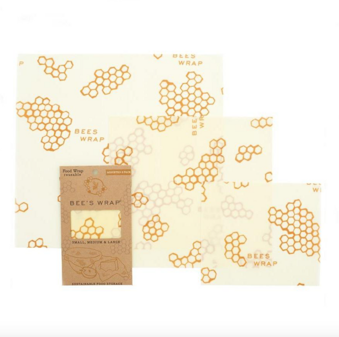 bee's wrap assorted 3 pack laydown with packaging on white background honeycomb