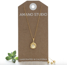 Load image into Gallery viewer, amano studio small round locket necklace front view in packaging
