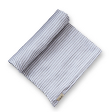Load image into Gallery viewer, pehr striped swaddle pebble laydown half rolled on white background
