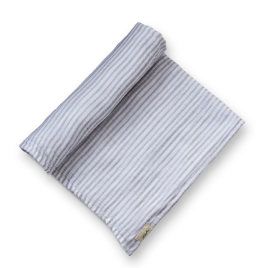 pehr striped swaddle pebble laydown half rolled on white background
