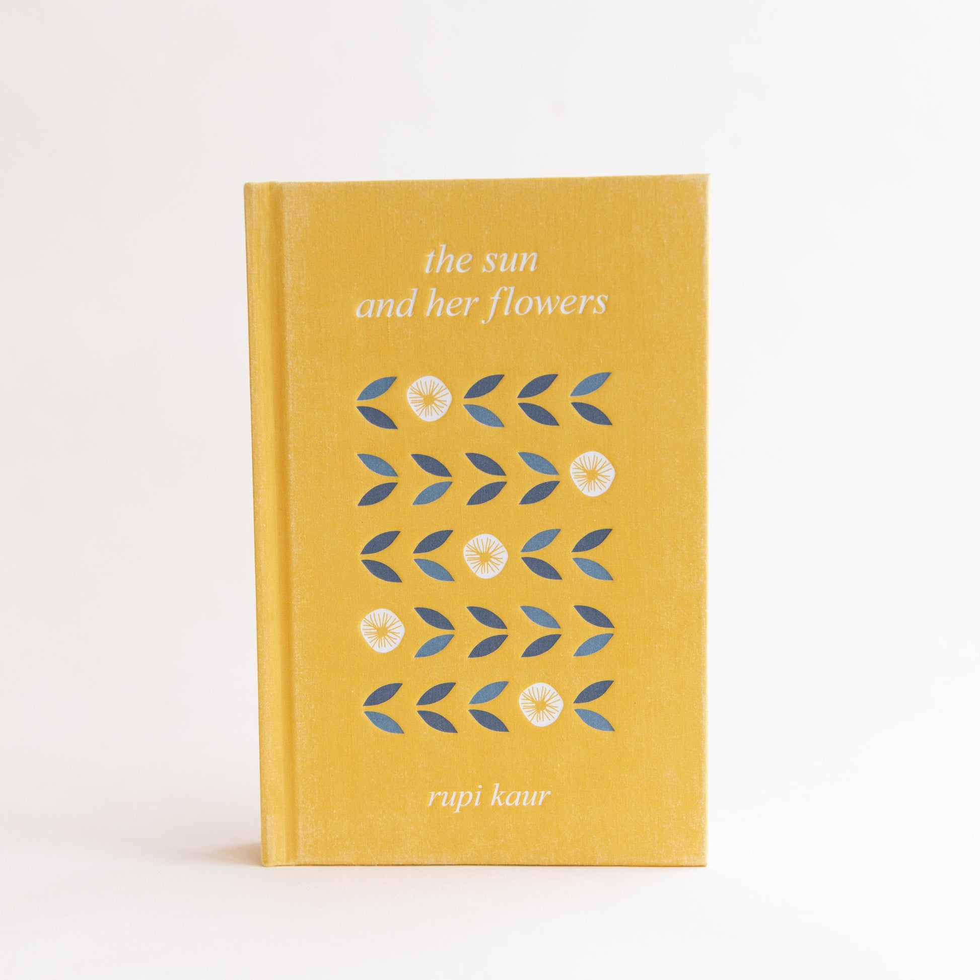 front cover of "the sun and her flowers"