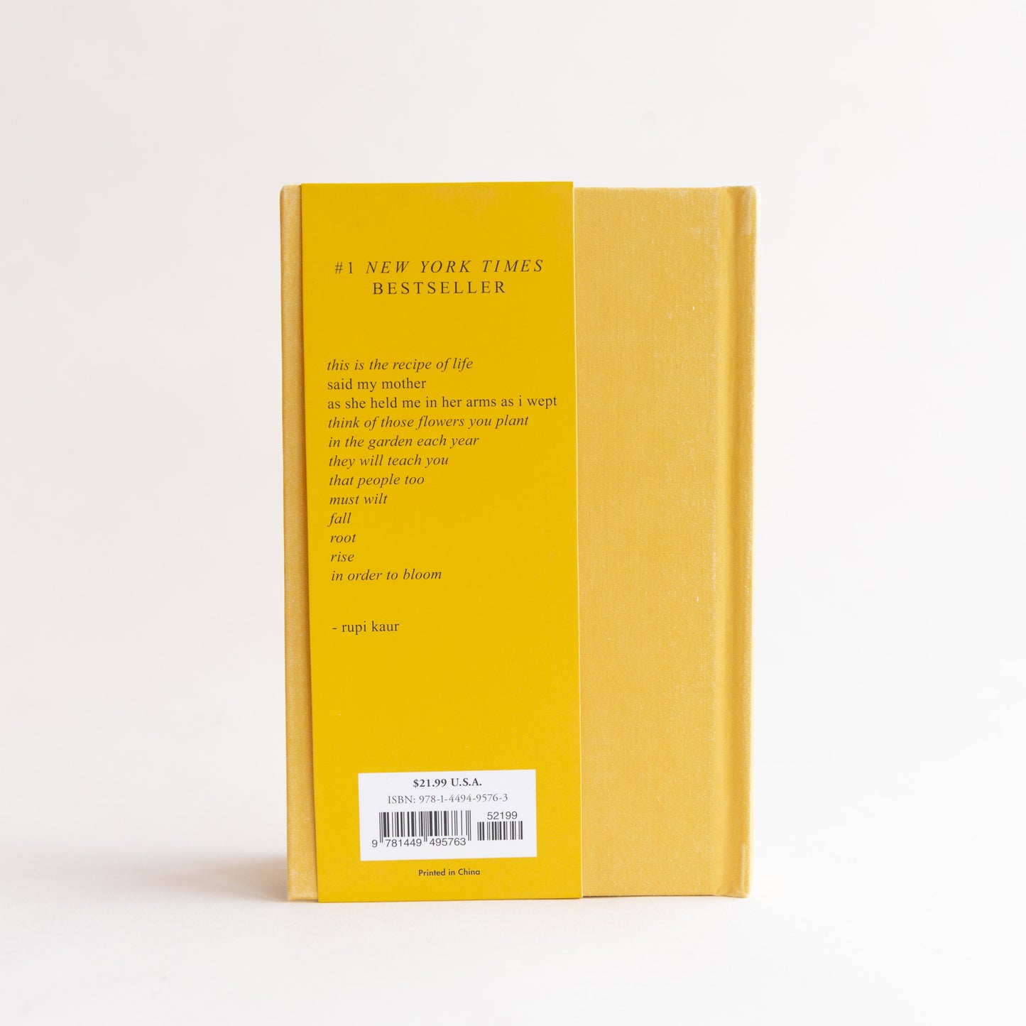 back cover of "the sun and her flowers"